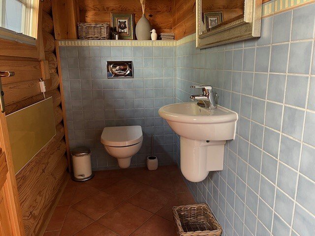 Pure Gemütlichkeit in einem traditionellen Holzblockbohlenhaus