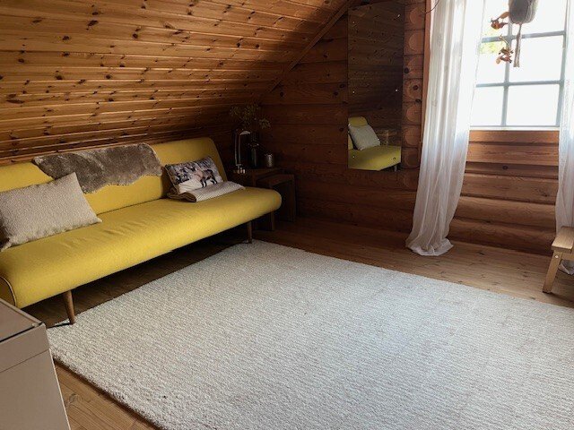 Pure Gemütlichkeit in einem traditionellen Holzblockbohlenhaus