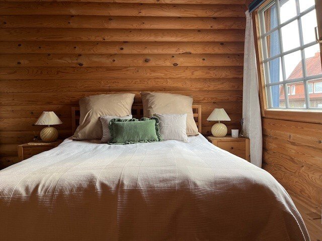 Pure Gemütlichkeit in einem traditionellen Holzblockbohlenhaus