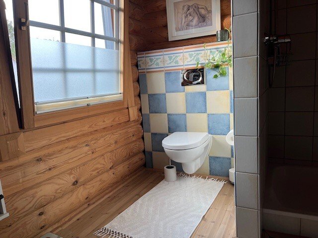 Pure Gemütlichkeit in einem traditionellen Holzblockbohlenhaus